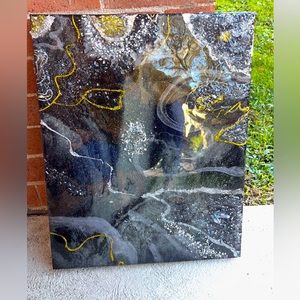 This is a custom marble gold silver Resin canvas art piece made by me.